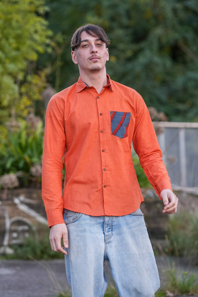 Chemise Manche longue unie Abricot poche Wax rouge et bleue